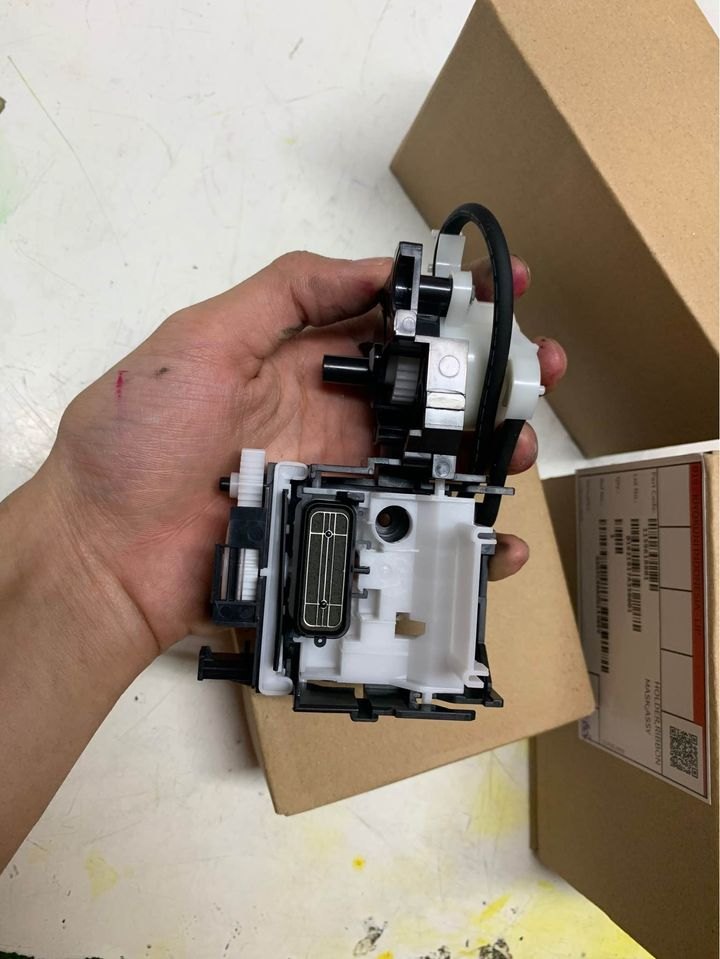 Mặt trên cụm bơm hút mực Epson L3110 L1110 với mũ hút cao su