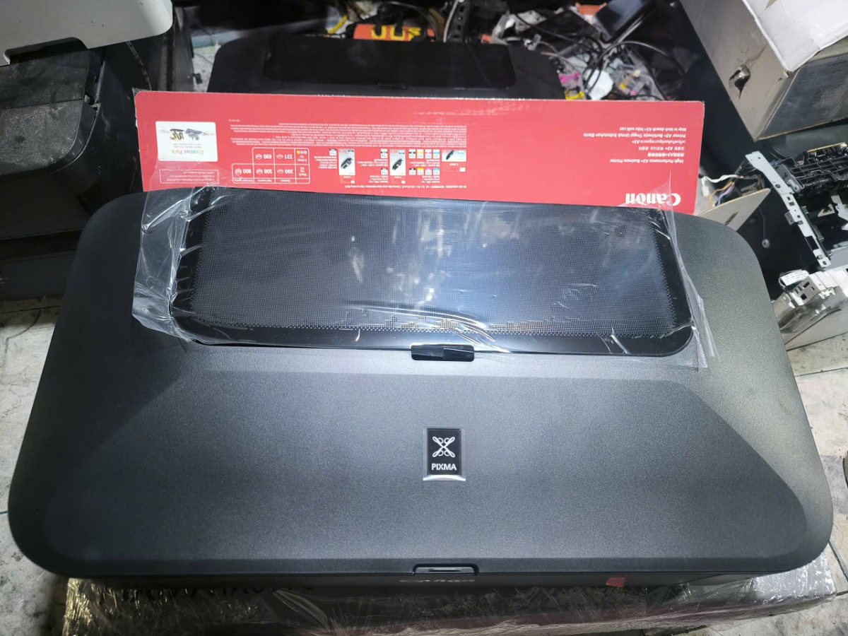 Canon IX6770 mới, mặt trên còn nguyên màng