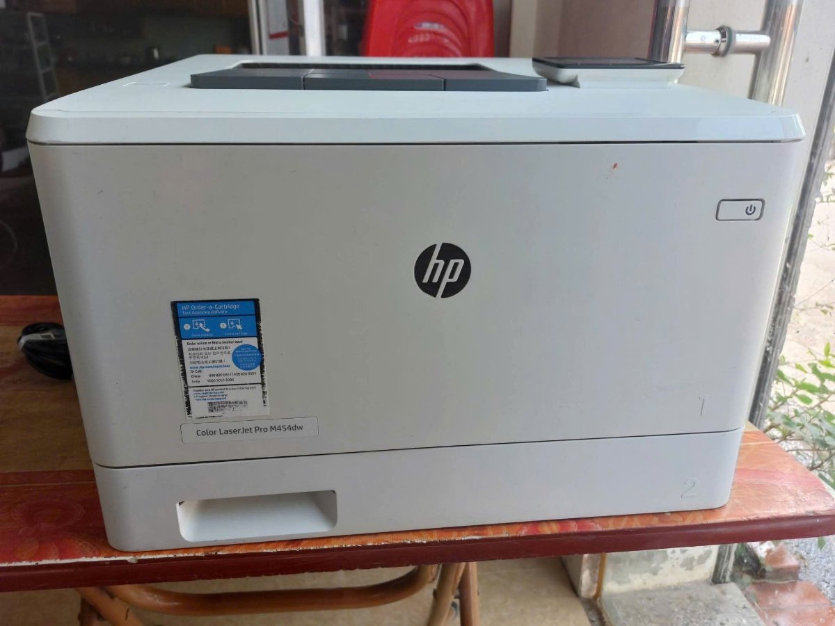 Máy in laser màu HP M454dw cũ like new tại Thần Vũ