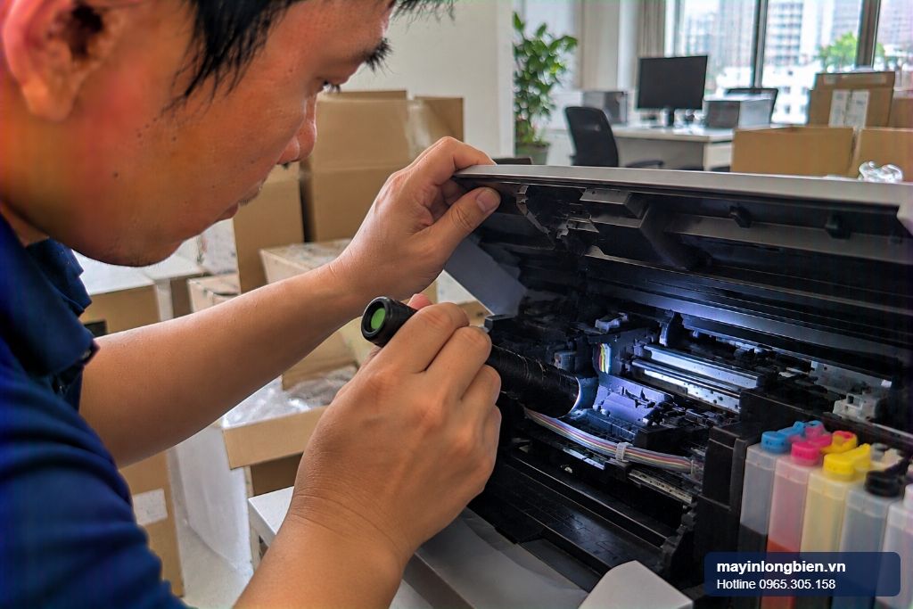 Máy in Epson báo lỗi 0xEA sau khi chuyển văn phòng, cụm đầu in kẹt