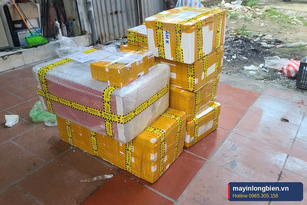 Lô máy in đóng gói cẩn thận trước khi giao cho khách tại Thần Vũ