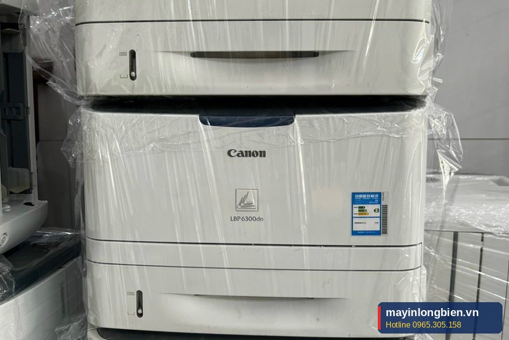 Các máy in Canon laser tại xưởng Thần Vũ chờ kiểm tra