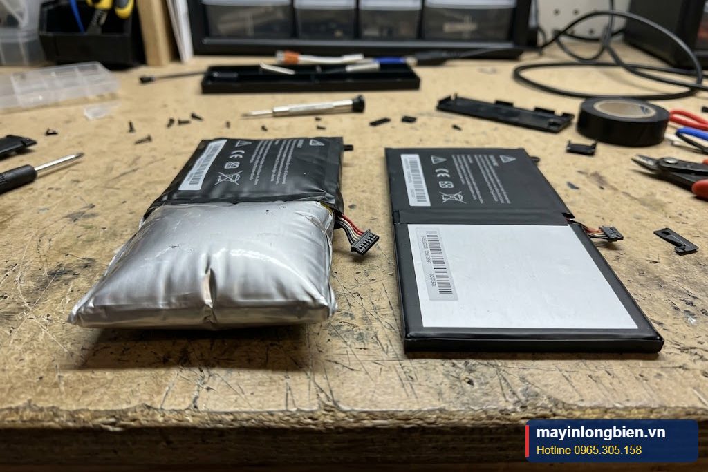Pin bị phồng làm cộm vỏ máy, cần thay pin MacBook sớm