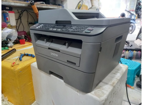 may-in-brother-mfc-l2701d-cu-nhin-nghieng-domucgiare-2