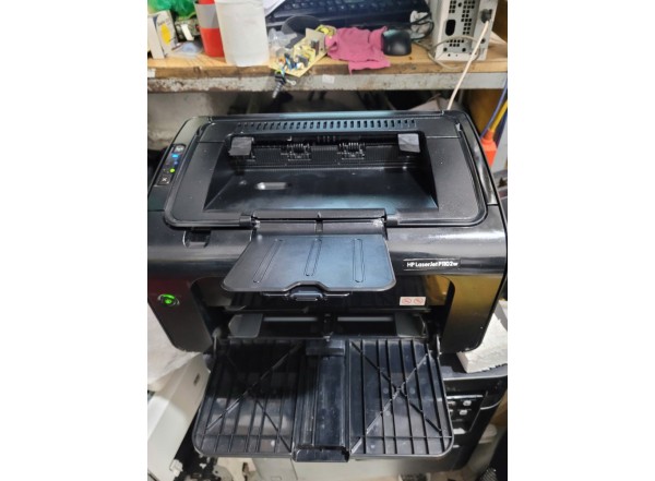 may-in-hp-p1102w-cu-khay-giay-domucgiare-2