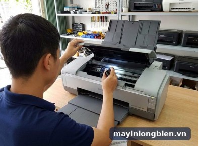 Sửa máy in Epson 1390 tại Long Biên: tắc đầu dẫn mực ngoài, kẹt giấy A3