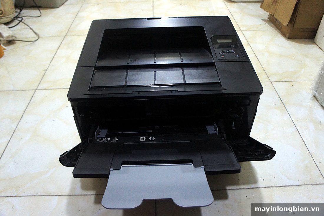 Khay giấy khổ lớn, cần chỉnh thanh chặn đúng khổ
