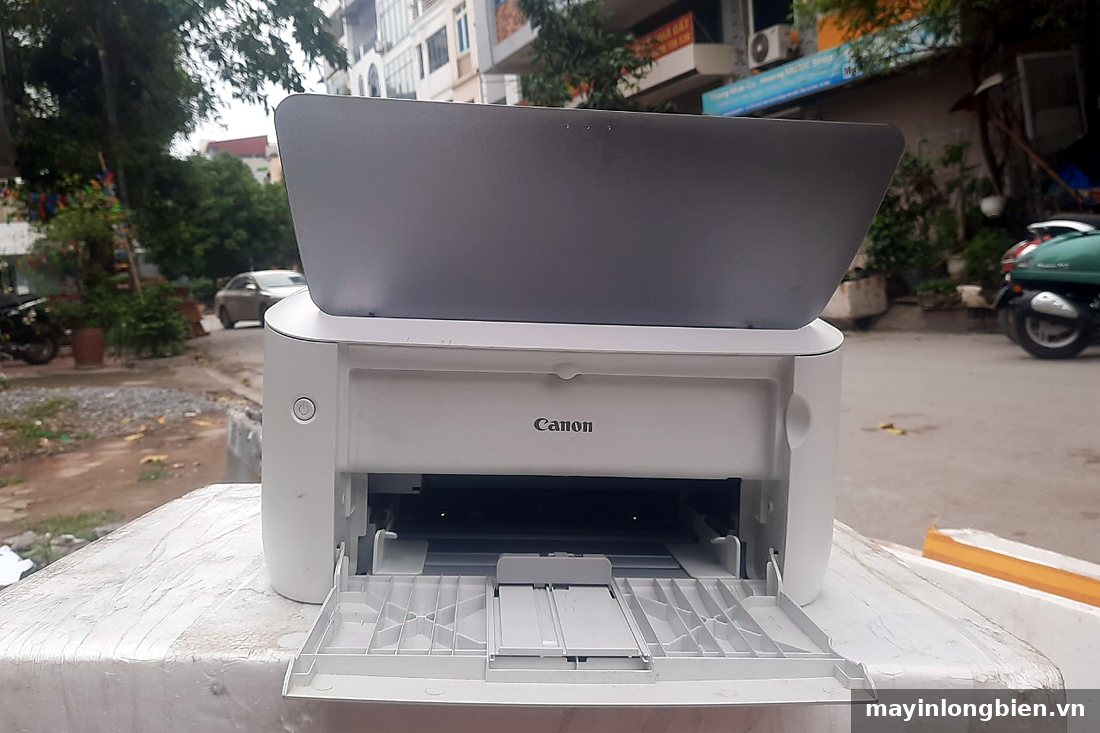 Máy in Canon mở khay giấy kiểm tra Máy in Canon mở khay giấy kiểm tra